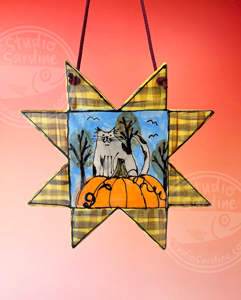 Hanging eight-pointed-star wall ceramic tile with cat and pumpkin