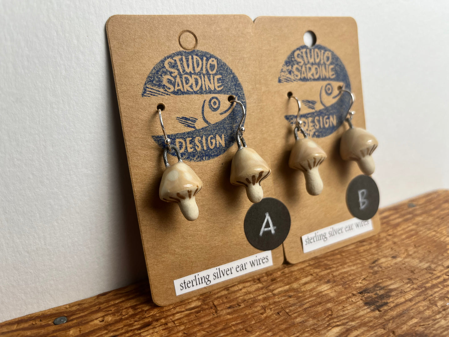 Tiny porcelain mushroom earrings, beige cap