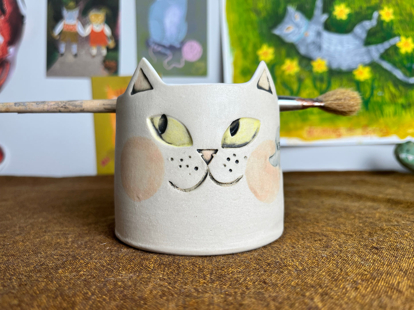 Mischievous cat watercolor brush cup