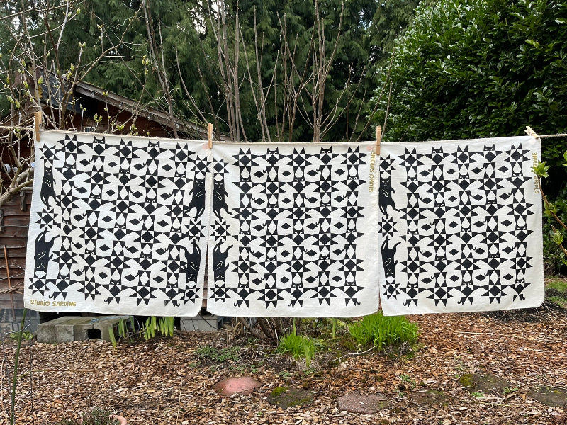 Quilty cat bandana screenprinted in black