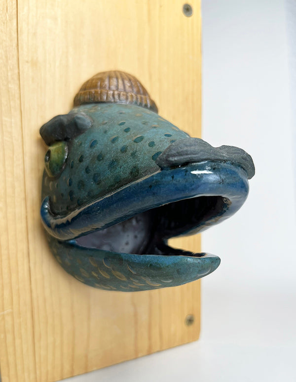 Julius fish-head wall-hanging with tan beanie, large