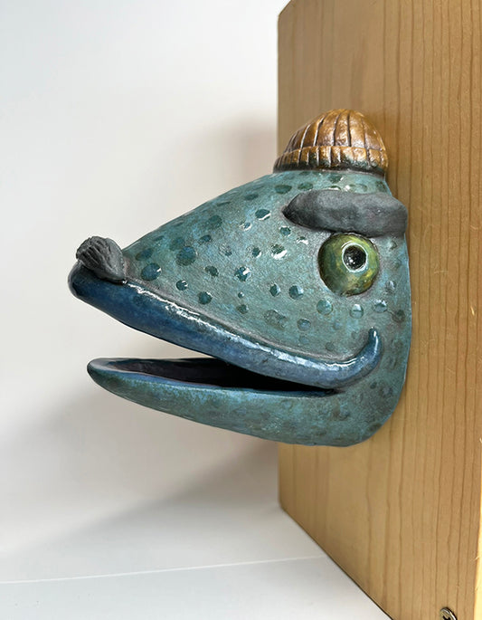 Fish-head wall-hanging with tan beanie, large