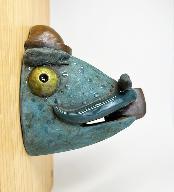 Herbert fish-head wall-hanging with bowler hat and pipe