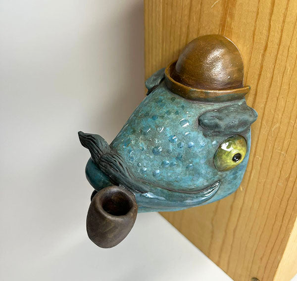 Herbert fish-head wall-hanging with bowler hat and pipe