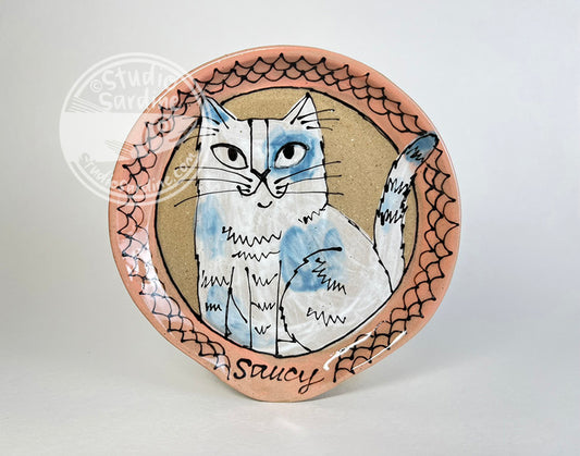 Hand-painted saucy cat stoneware spoon rest