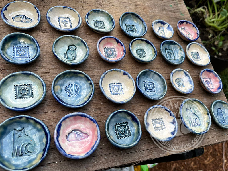 Tiny stamped ceramic pill dishes