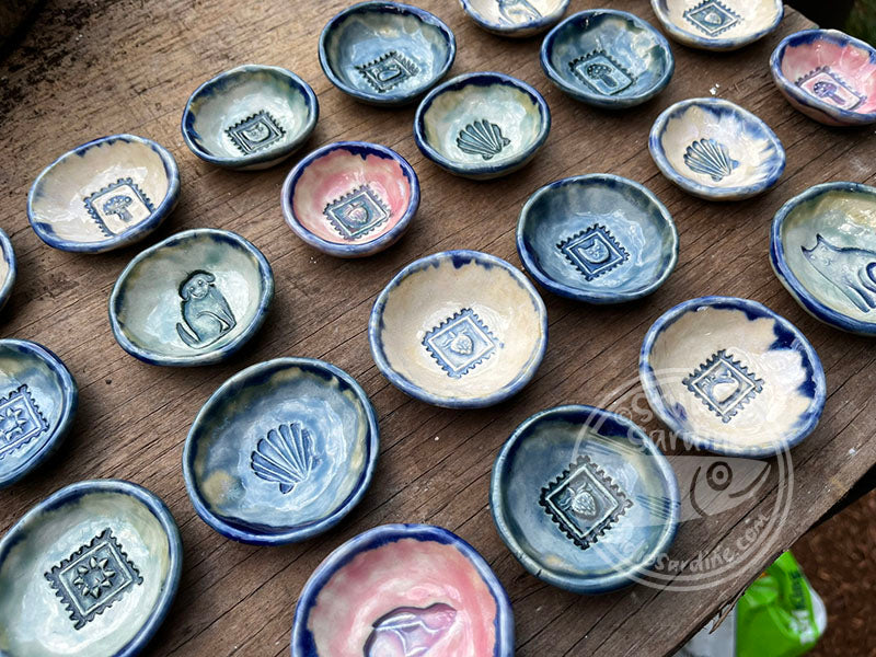 Tiny stamped ceramic pill dishes