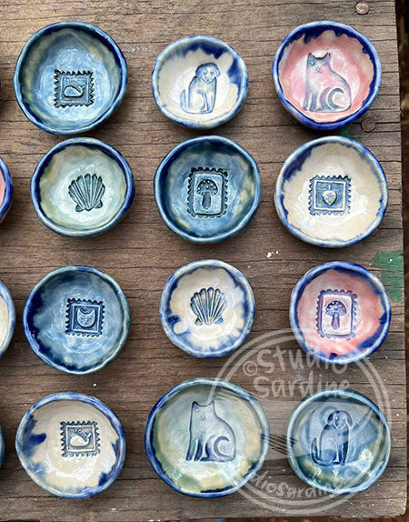 Tiny stamped ceramic pill dishes