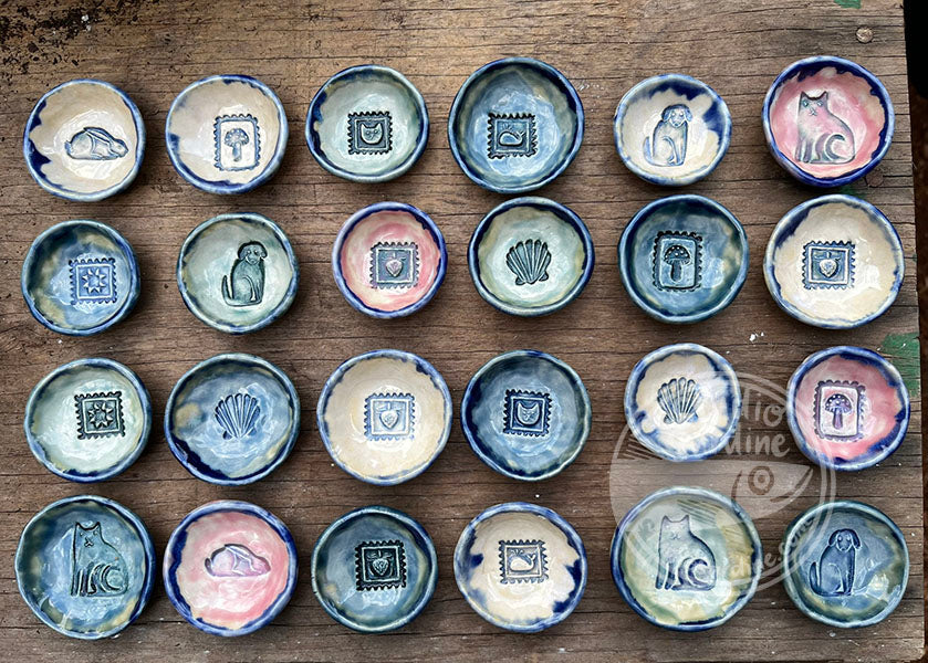 Tiny stamped ceramic pill dishes