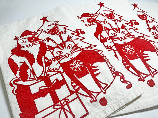 Festive Felines hand-printed tea towel in merry red