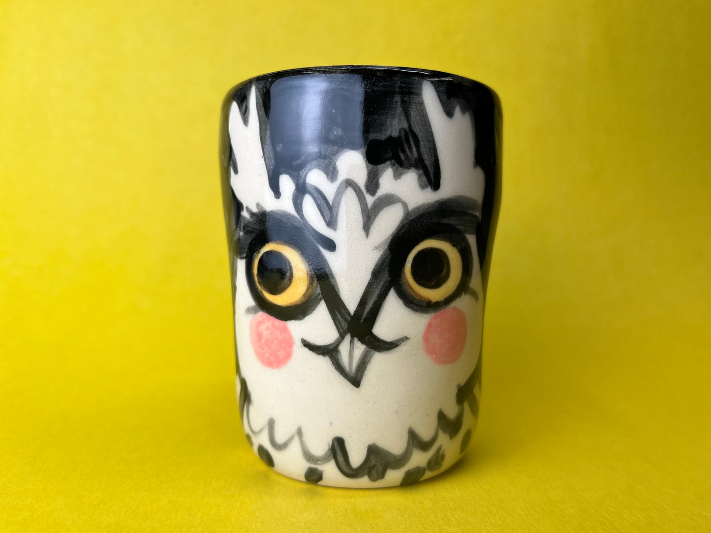 Night Owl tumbler with unibrow