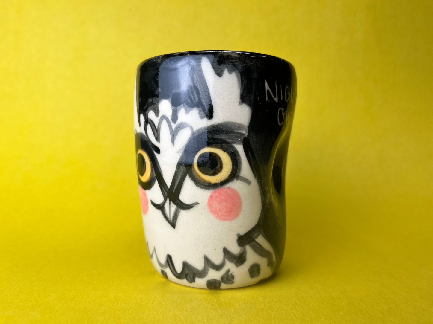 Night Owl tumbler with unibrow