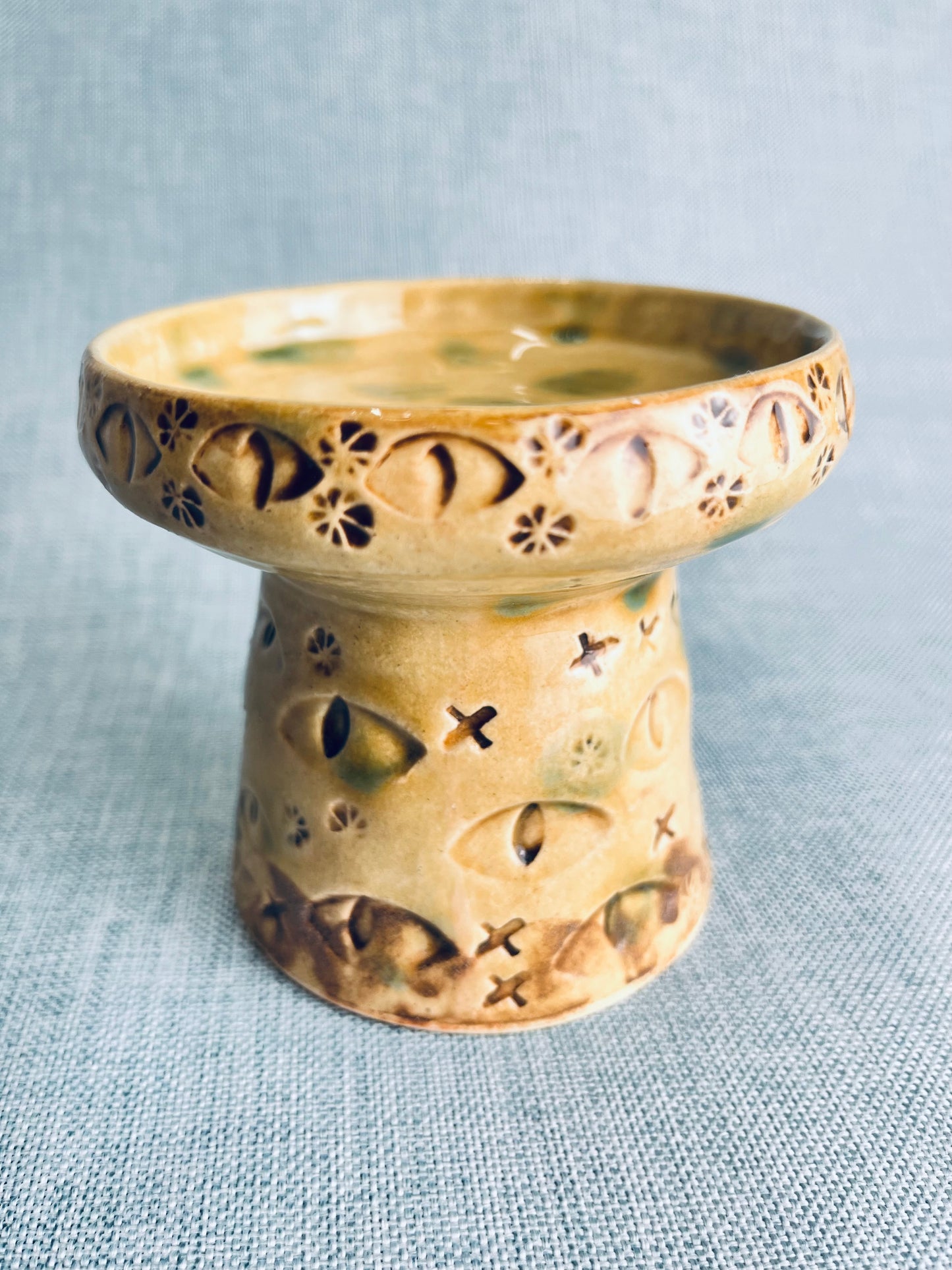 Cat's eye votive candle pedestal