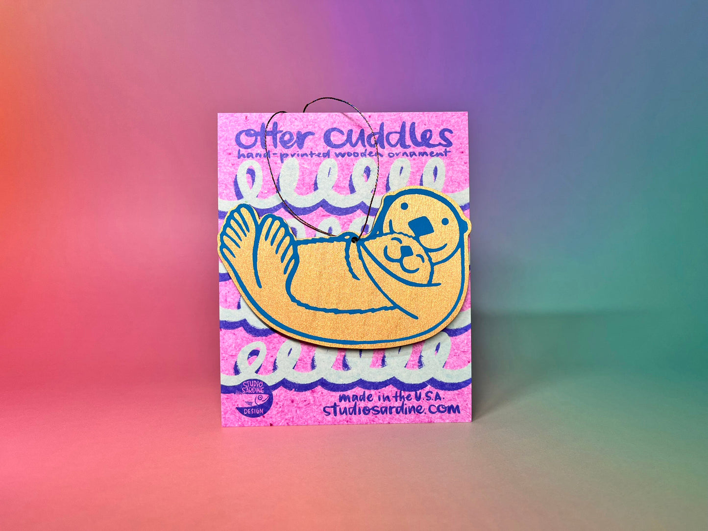 Printed “Otter Cuddles” wooden cut-out ornaments