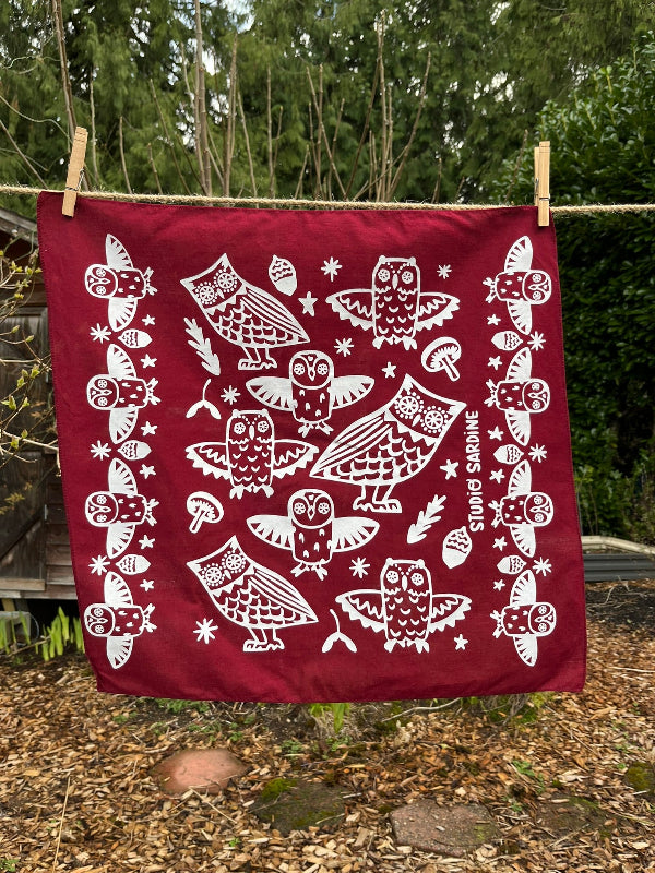 Ceramic owl bandana screenprinted in white on maroon- skewed bandanas