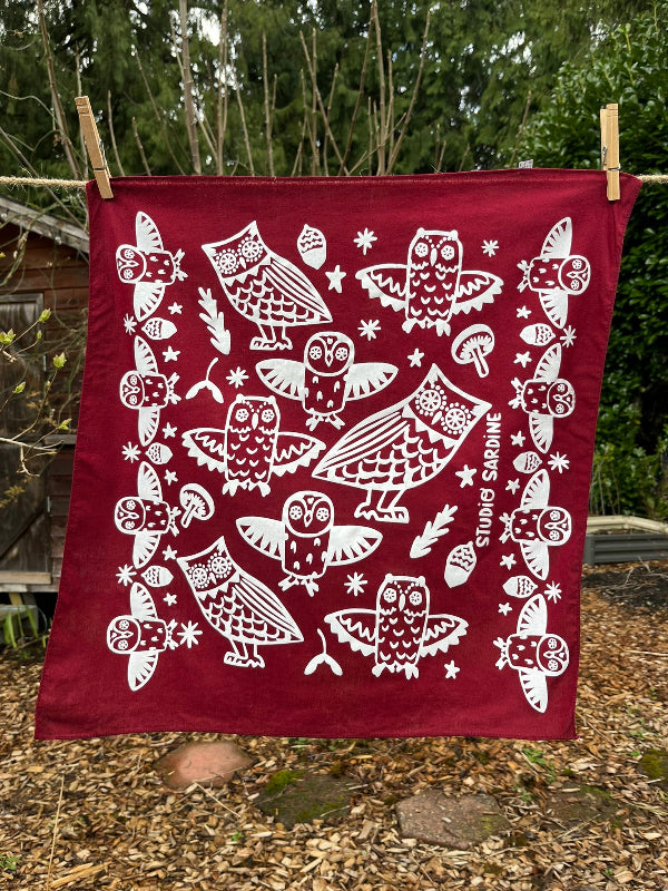 Ceramic owl bandana screenprinted in white on maroon- skewed bandanas